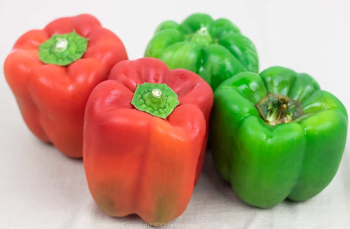 2 red and 2 green whole bell peppers