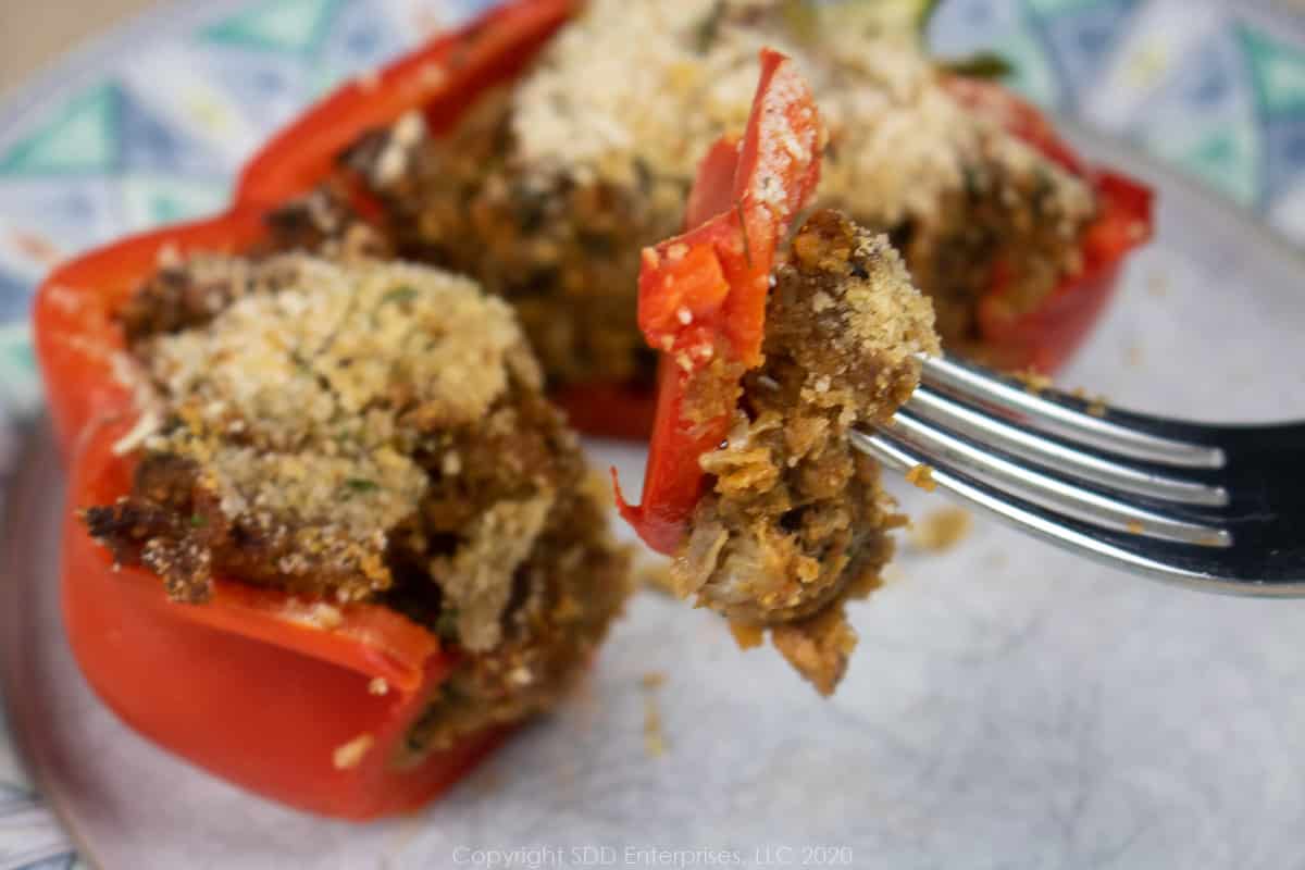 a bite of stuffed pepper on a fork