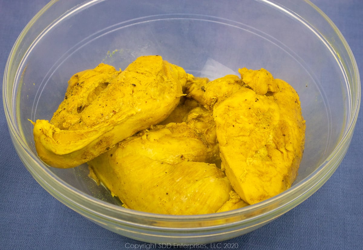 cooked chicken breasts in