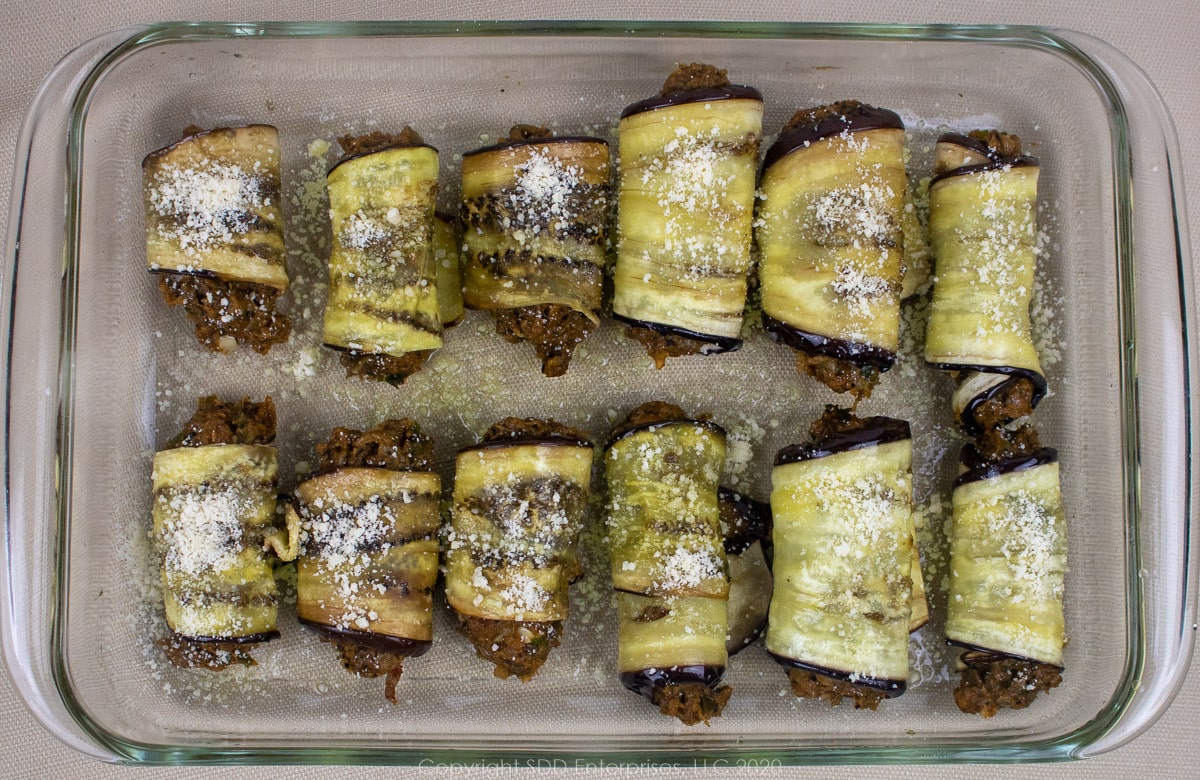 crawfish eggplant rollatini in a prepared baking dish