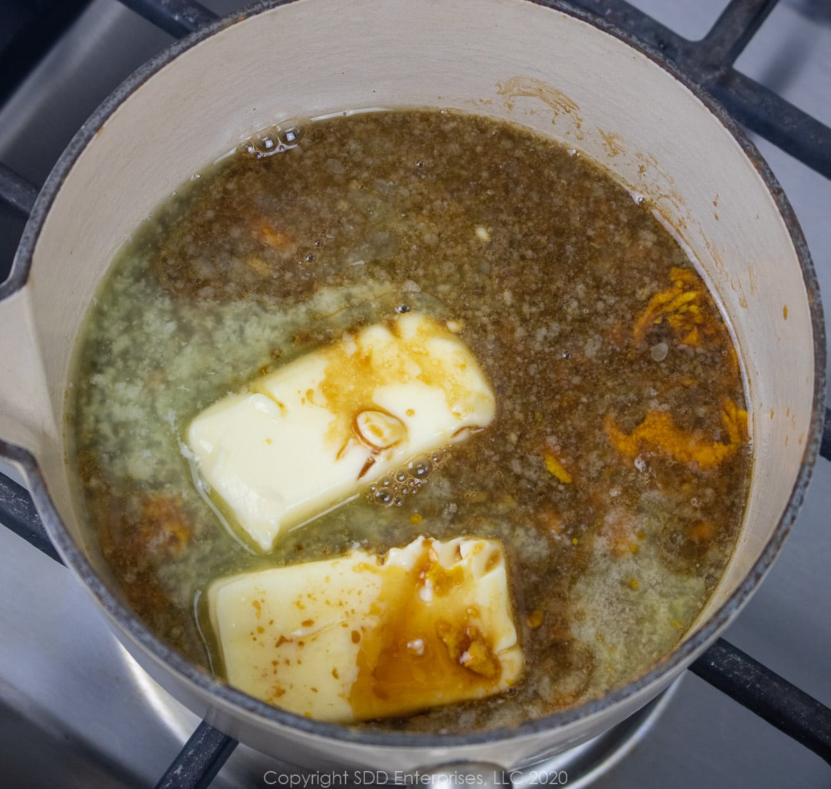cane syrup and soy sauce added to butter in a small sauce pan