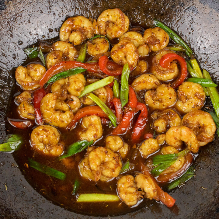 shrimp with cane syrup sauce in a wok