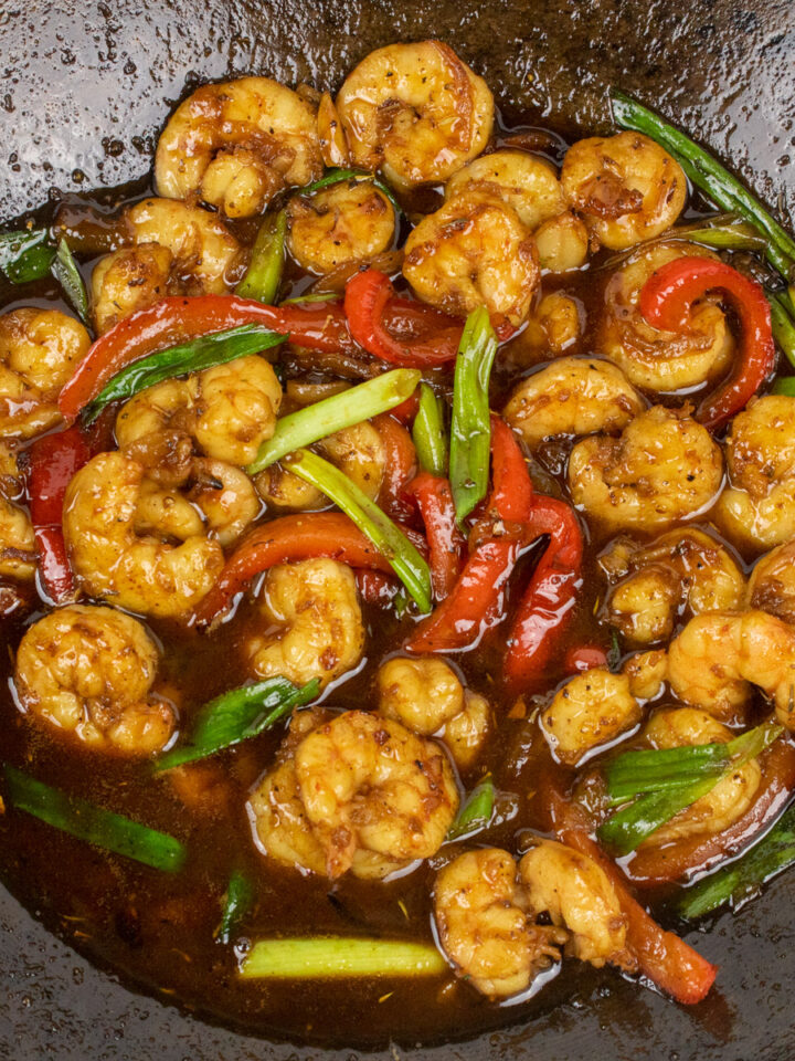 shrimp with cane syrup sauce in a wok