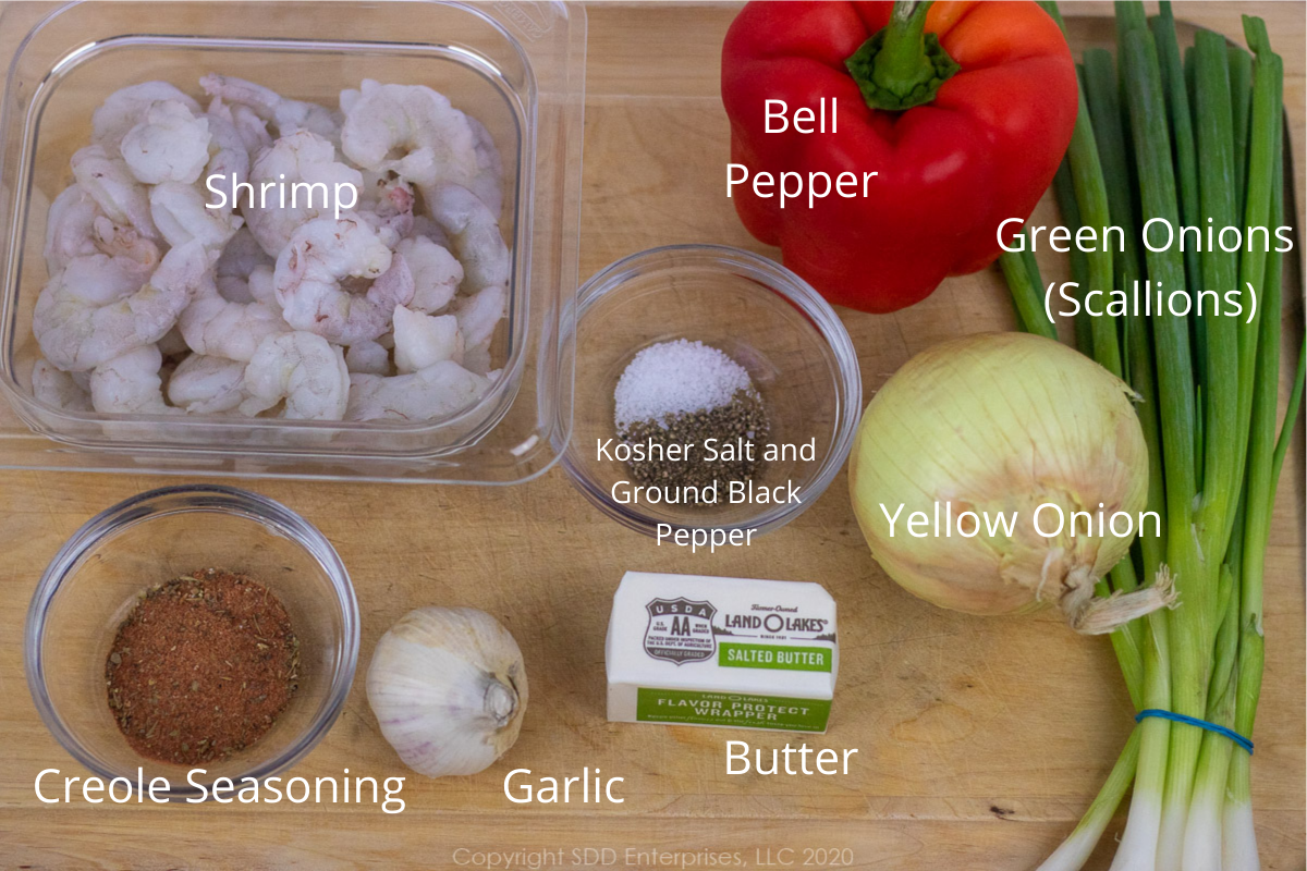 ingredients for shrimp with cane syrup sauce on a cutting board