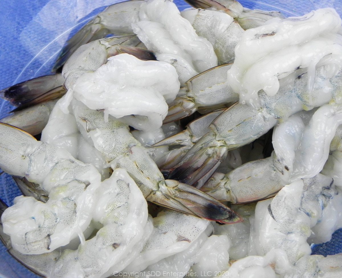 peeled and butterflied shrimp in a bowl