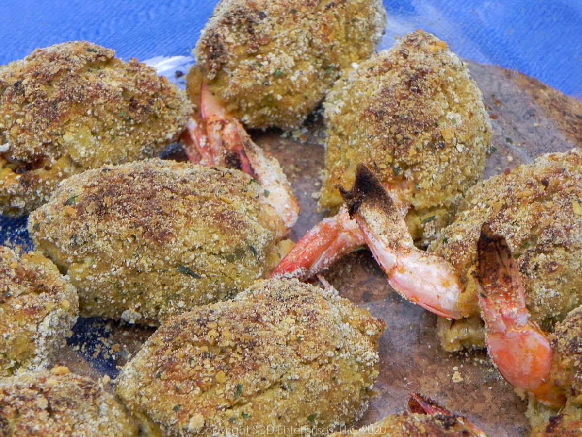 crab meat stuffed shrimp in a baking dish right from the oven