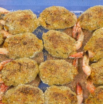 baked crab meat stuffed shrimp in a baking dish