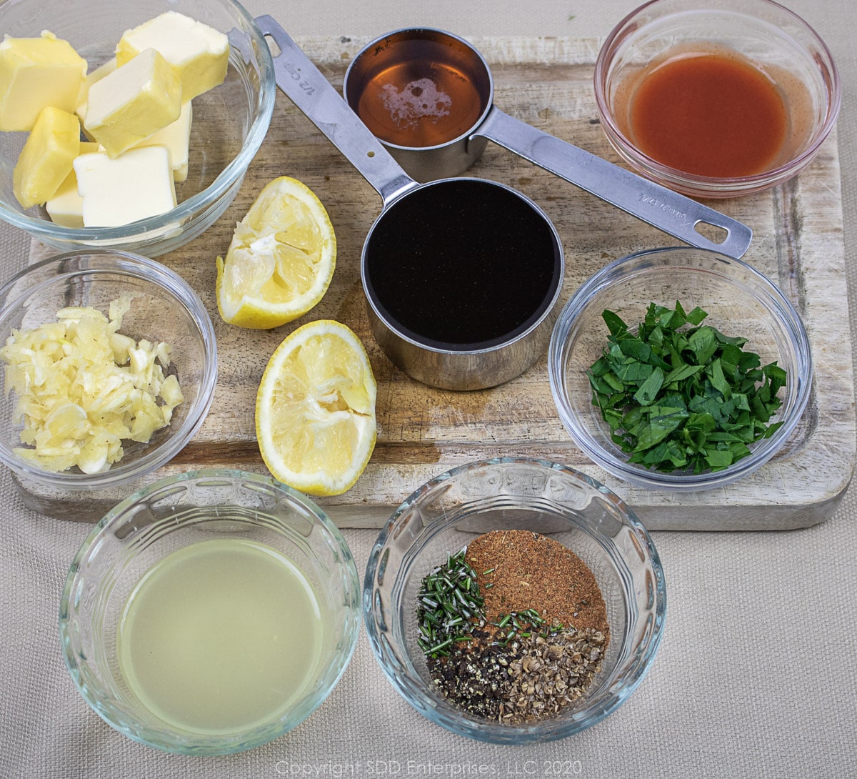 prepared ingredients for barbecued shrimp in small bowls