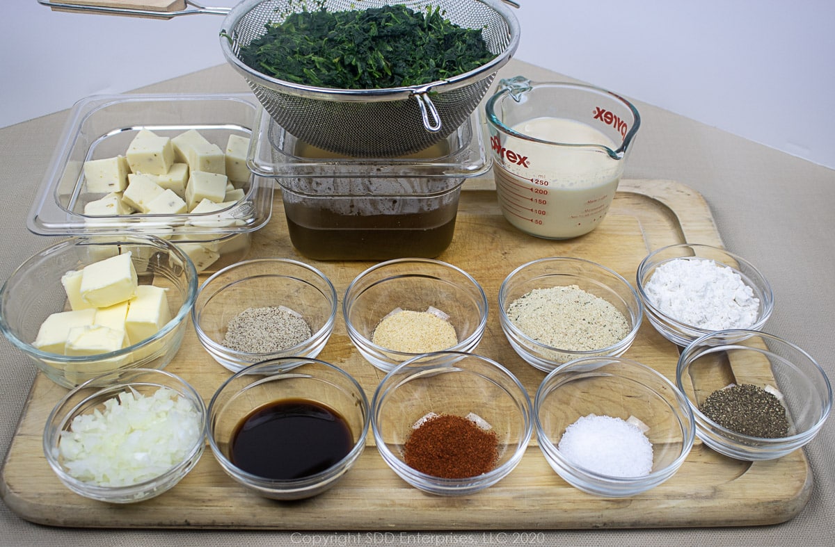 ingredients for spinach Madeleine in separate prep bowls