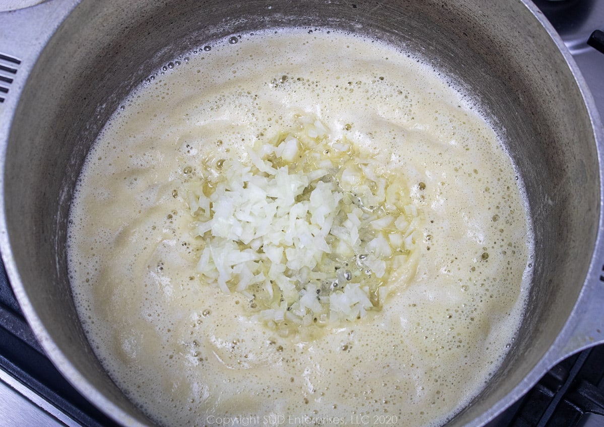 onions in a light roux in a dutch oven