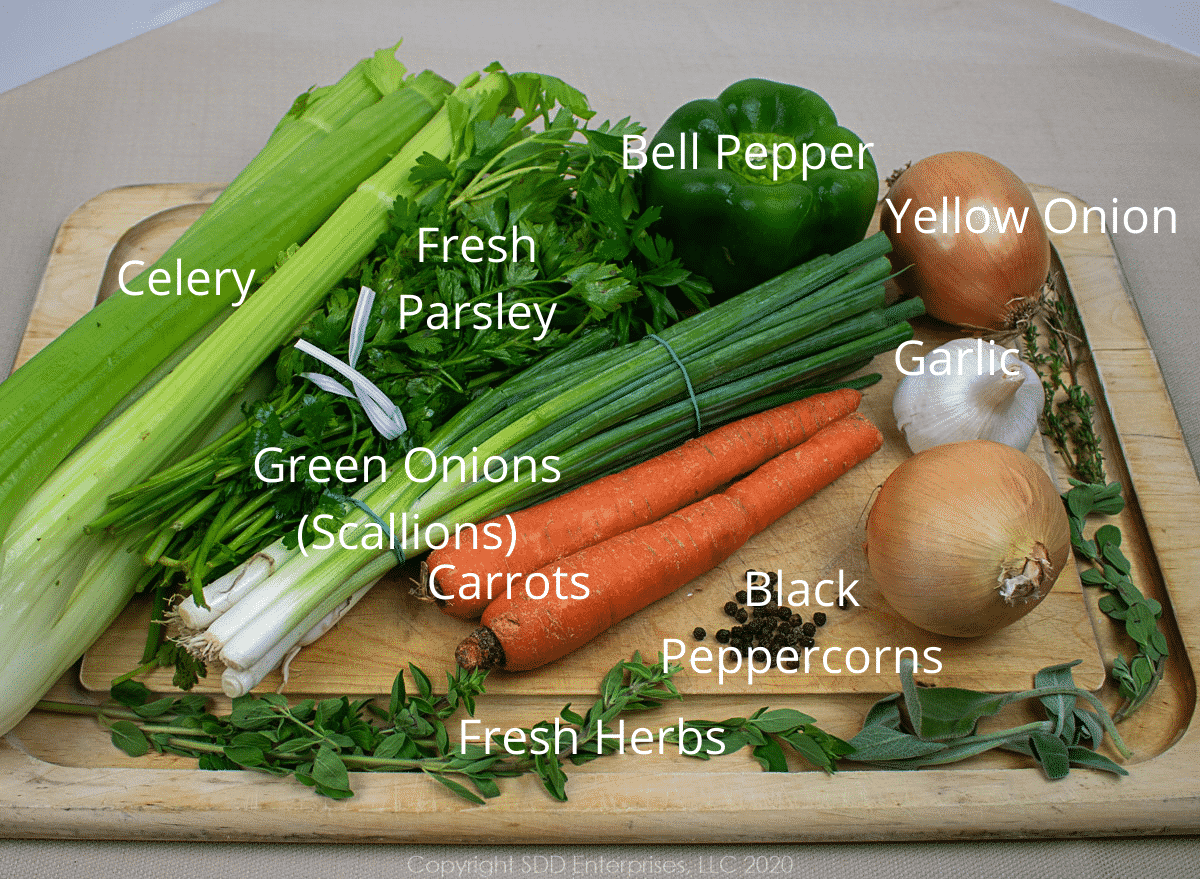 ingredients for homemade chicken stock on a cutting board