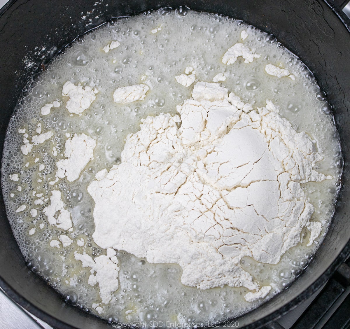 flour added to oil in a dutch oven to make a roux