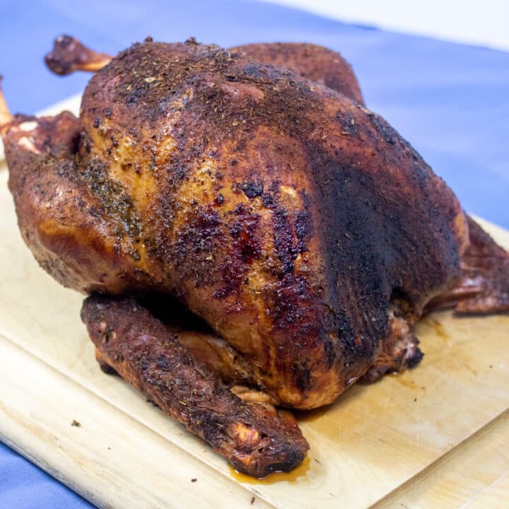 smoked turkey on a cutting board