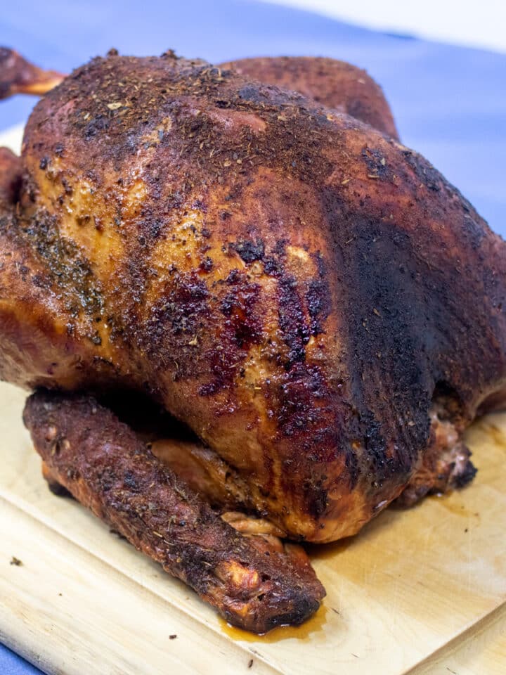 smoked turkey on a cutting board