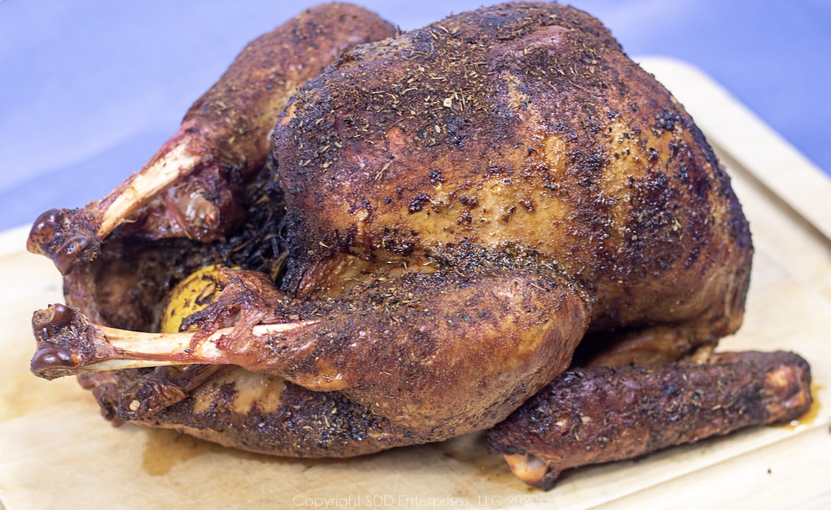 smoked turkey on cutting board