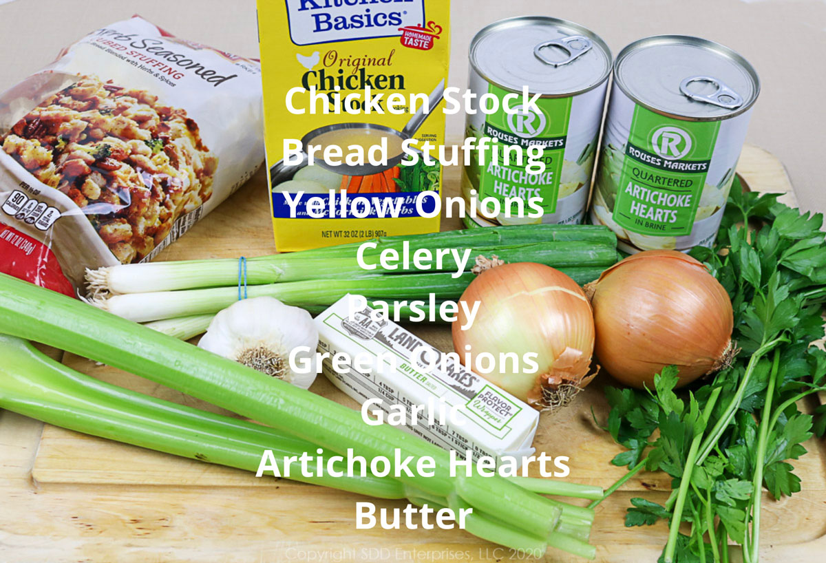 ingredients for oyster artichoke dressing on a cutting board