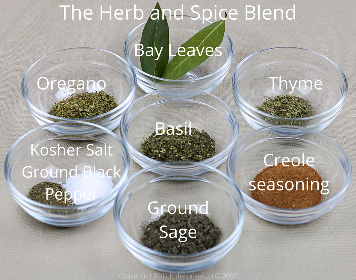 herbs and spices in individual prep bowls for oyster artichoke dressing