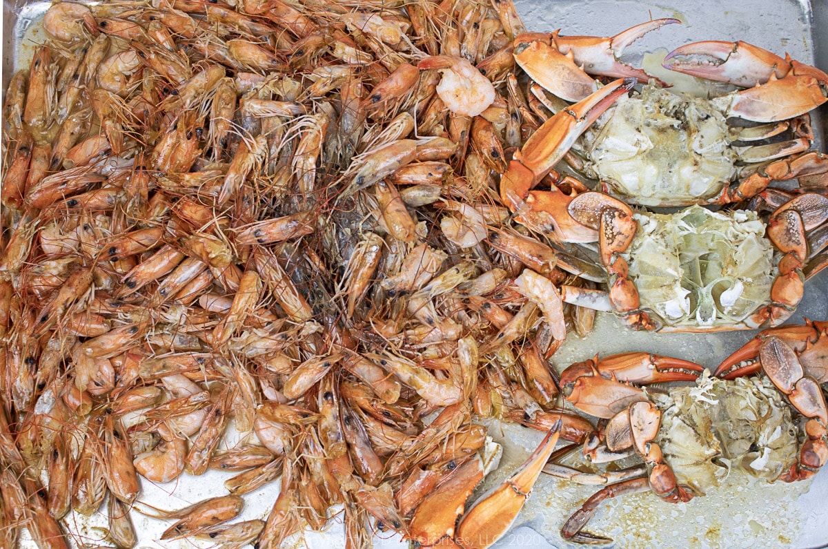 roasted shrimp and crab shells on a baking sheet