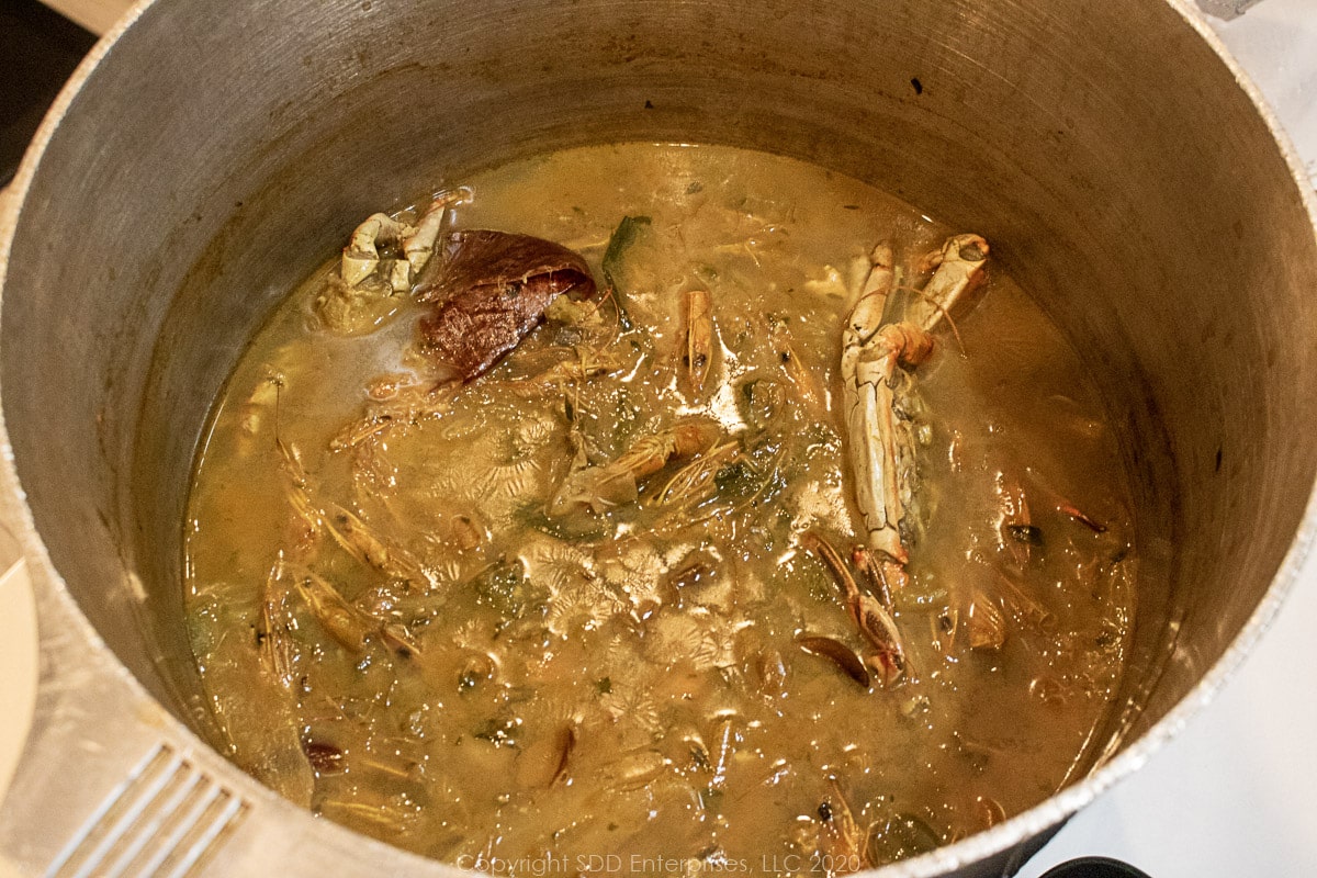 seafood stock reduced in a stockpot