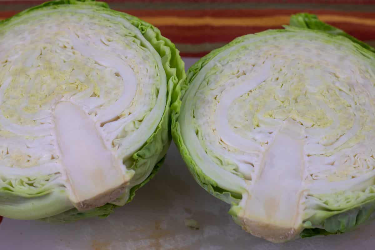 head of cabbage sliced in half lengthwise
