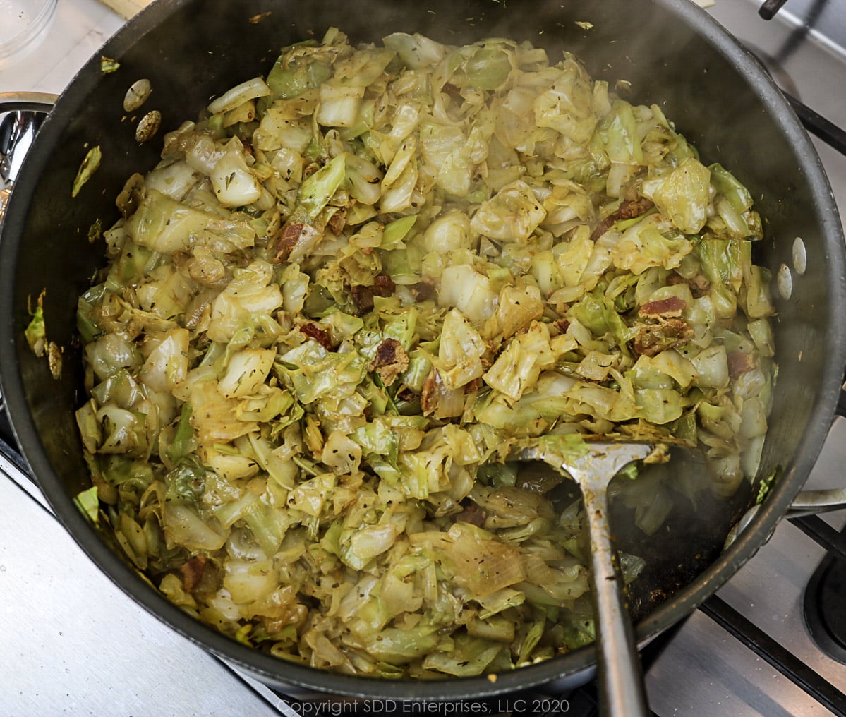 cabbage cooked down in a dutch oven