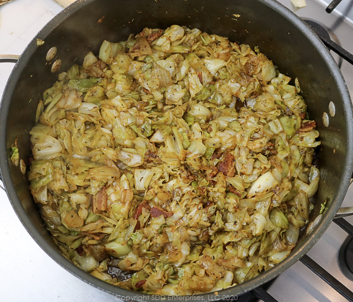 fried cabbage in a dutch oven