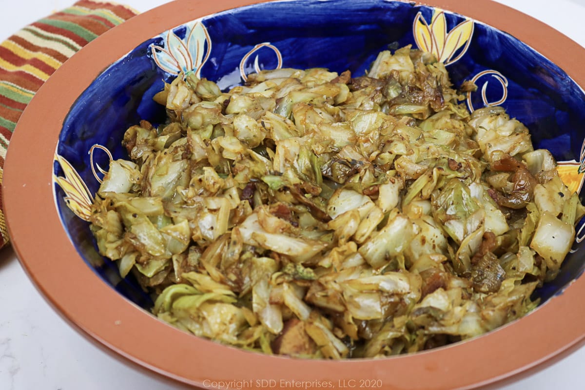 fried cabbage with cane syrup in a decorative bowl