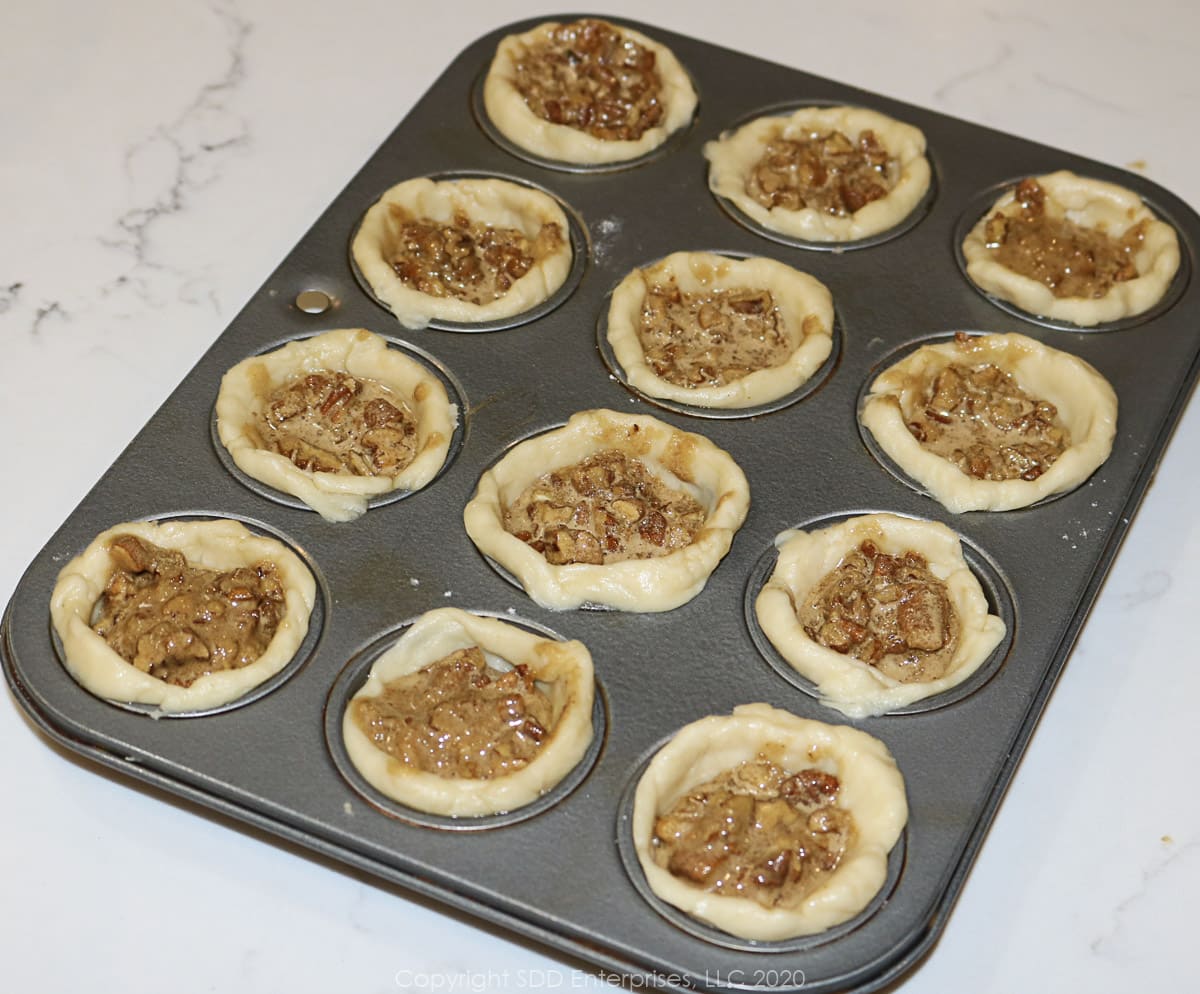 mini pecan tarts ready for the oven