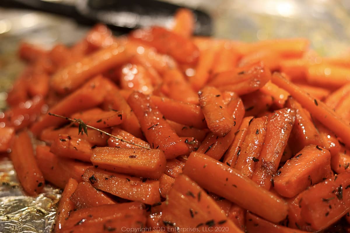 roastd carrots with cane syrup on baking sheet right out of the oven