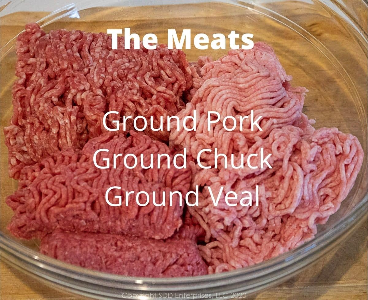 ground beef, pork and veal in a glass bowl