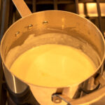 bechamel sauce in a sauce pan on the stove