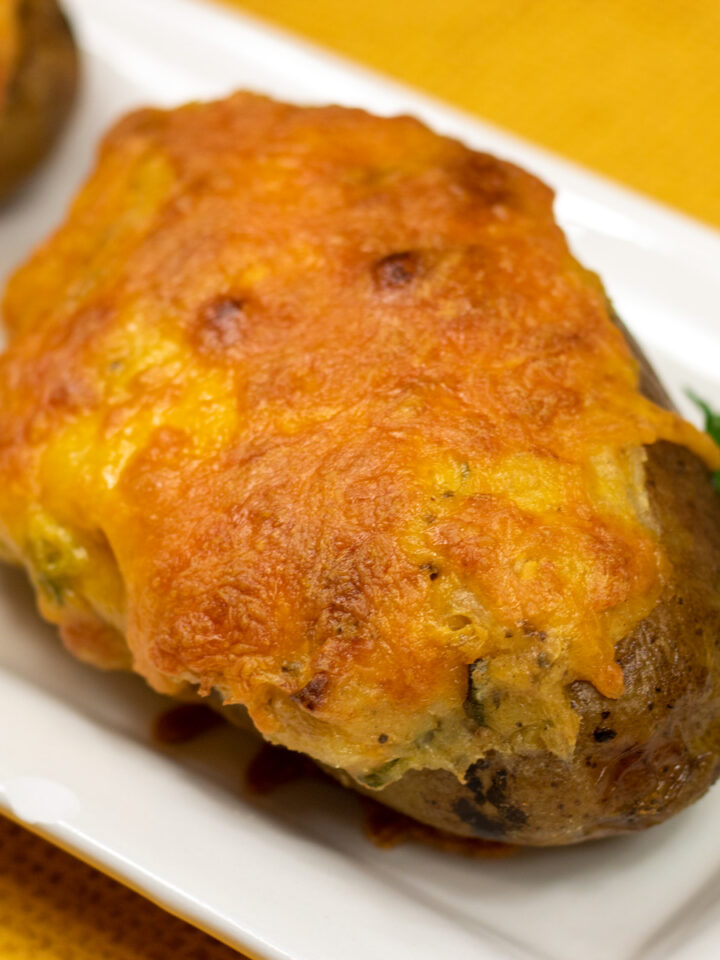 cajun stuffed potatoes on a white serving platter