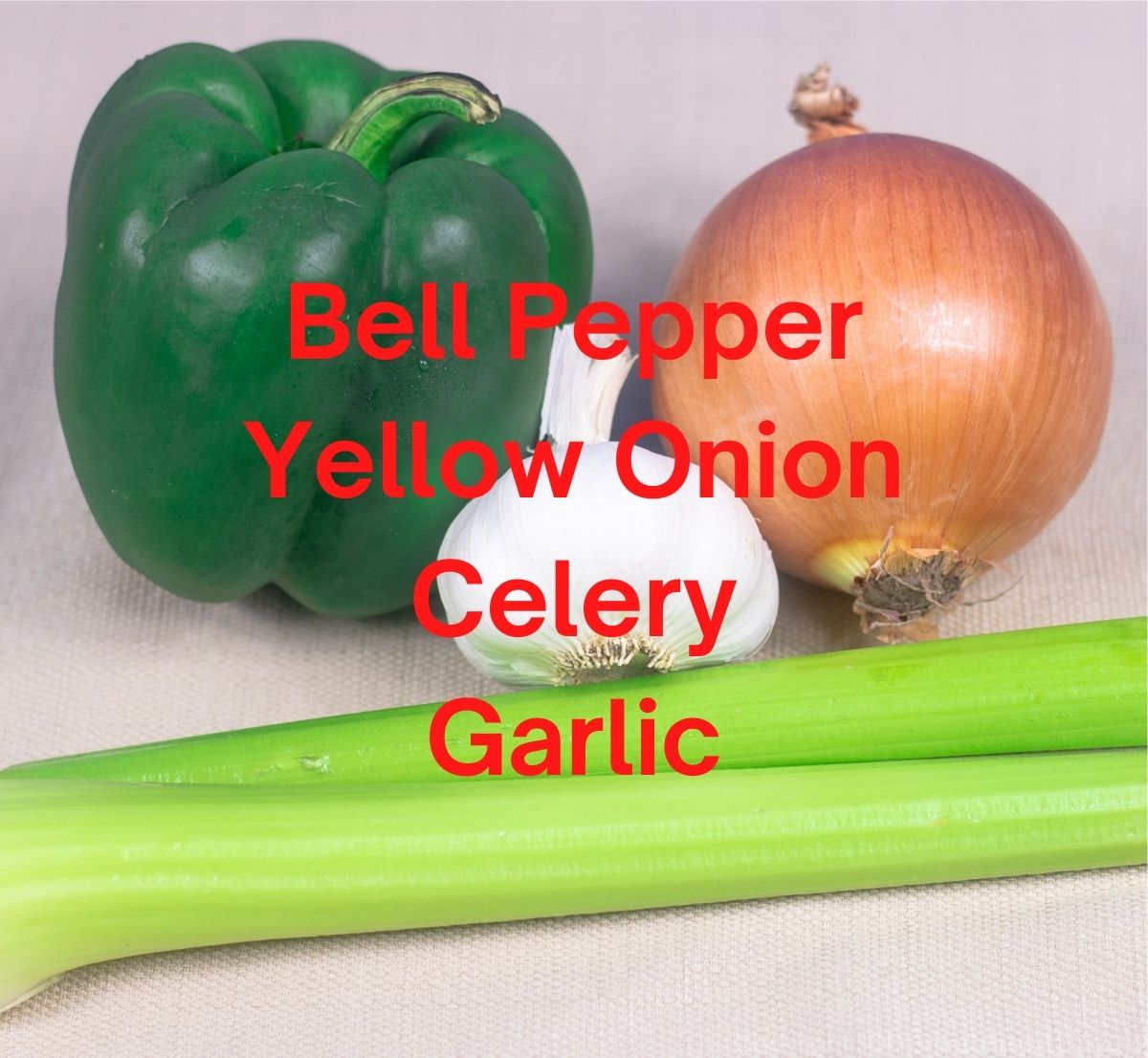 bell peppers, yellow onions, celery stalks and a whole garlic
