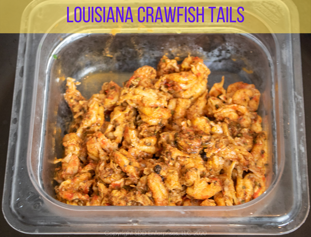 Louisiana Crawfish Tails with seasonings in a prep bowl