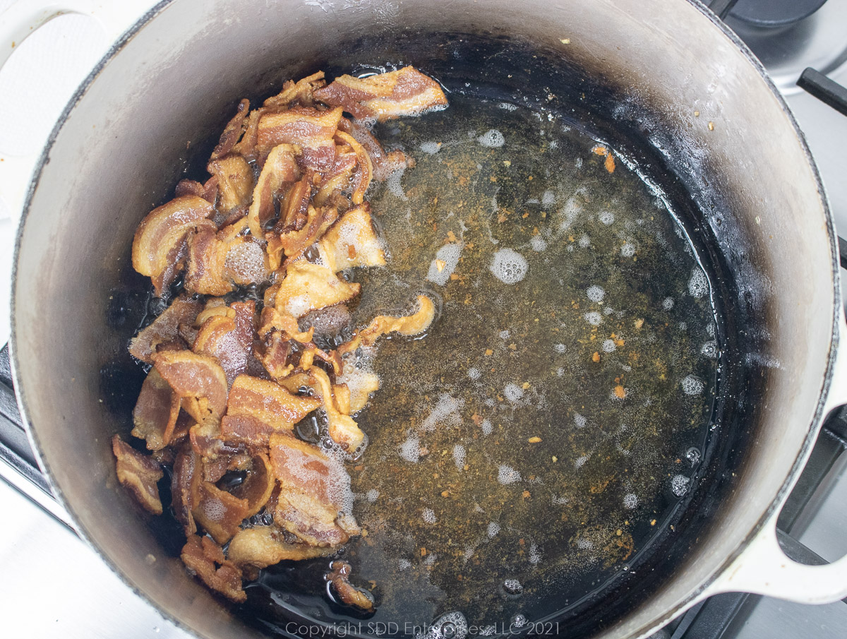 bacon frying n a Dutch oven