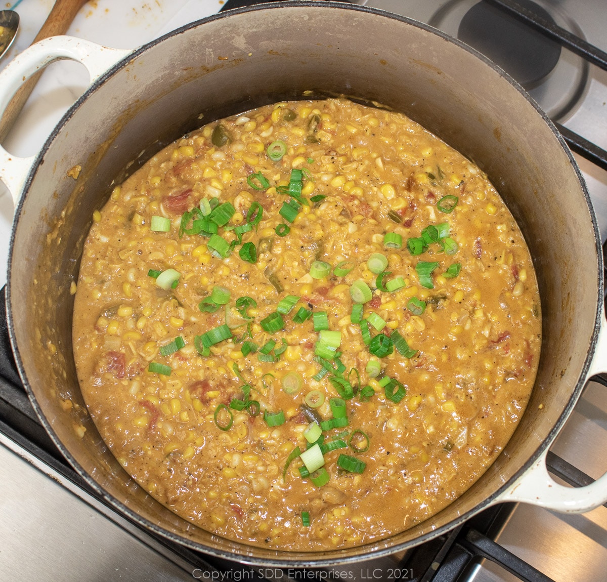 corn maque choux in a Dutch oven