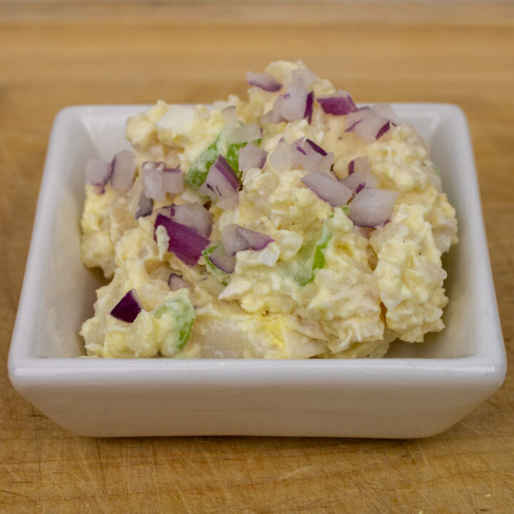 potato salad in a small white bowl