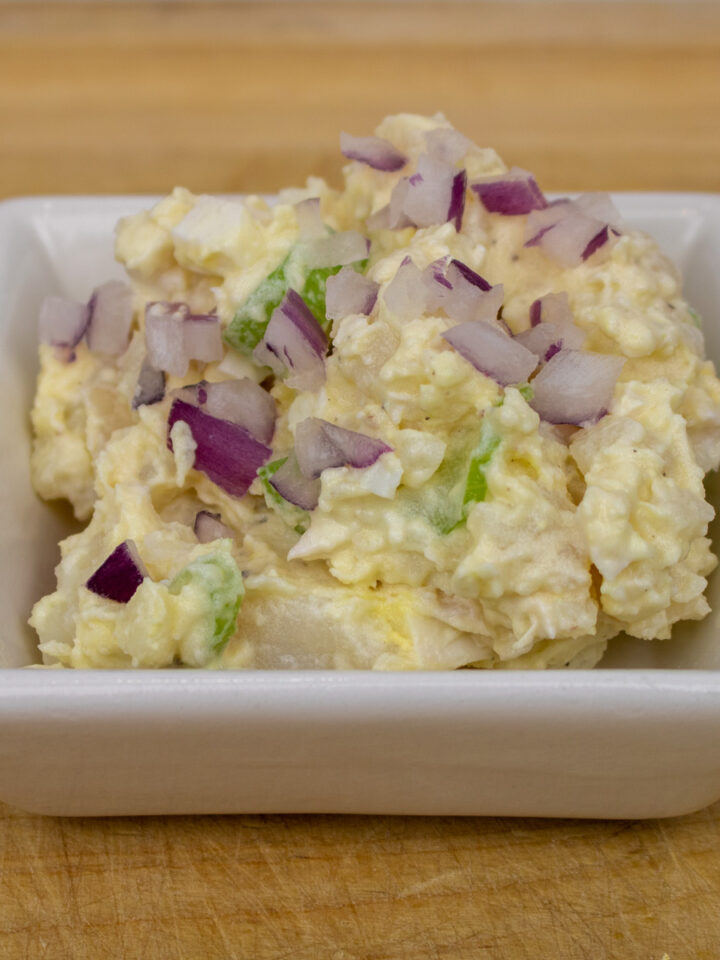 potato salad in a small white bowl