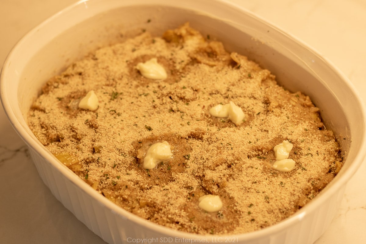 squash casserole in a baking dish ready for the oven