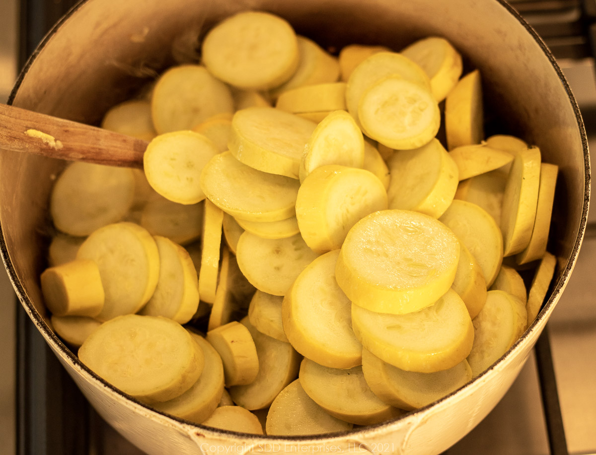 sliced yellow squash in a Dutch oven