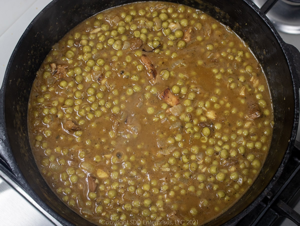 peas in a roux in a Dutch oven