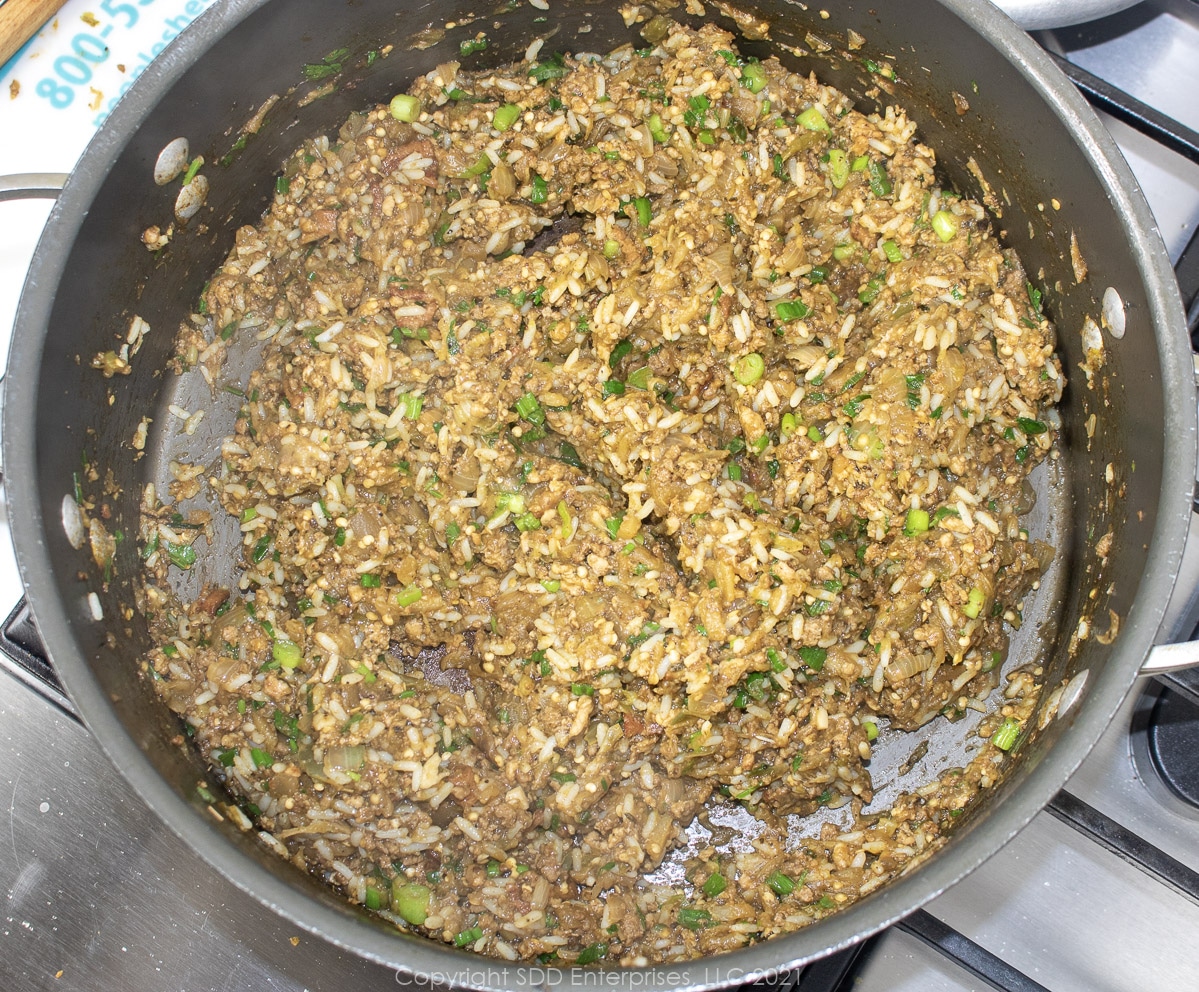 combined ingredients for eggplant dressing in a Dutch oven