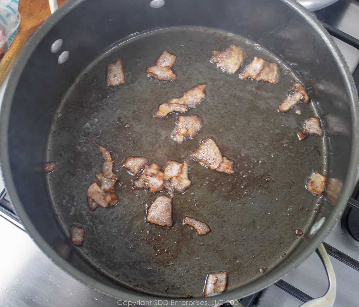 frying bacon in a Dutch oven