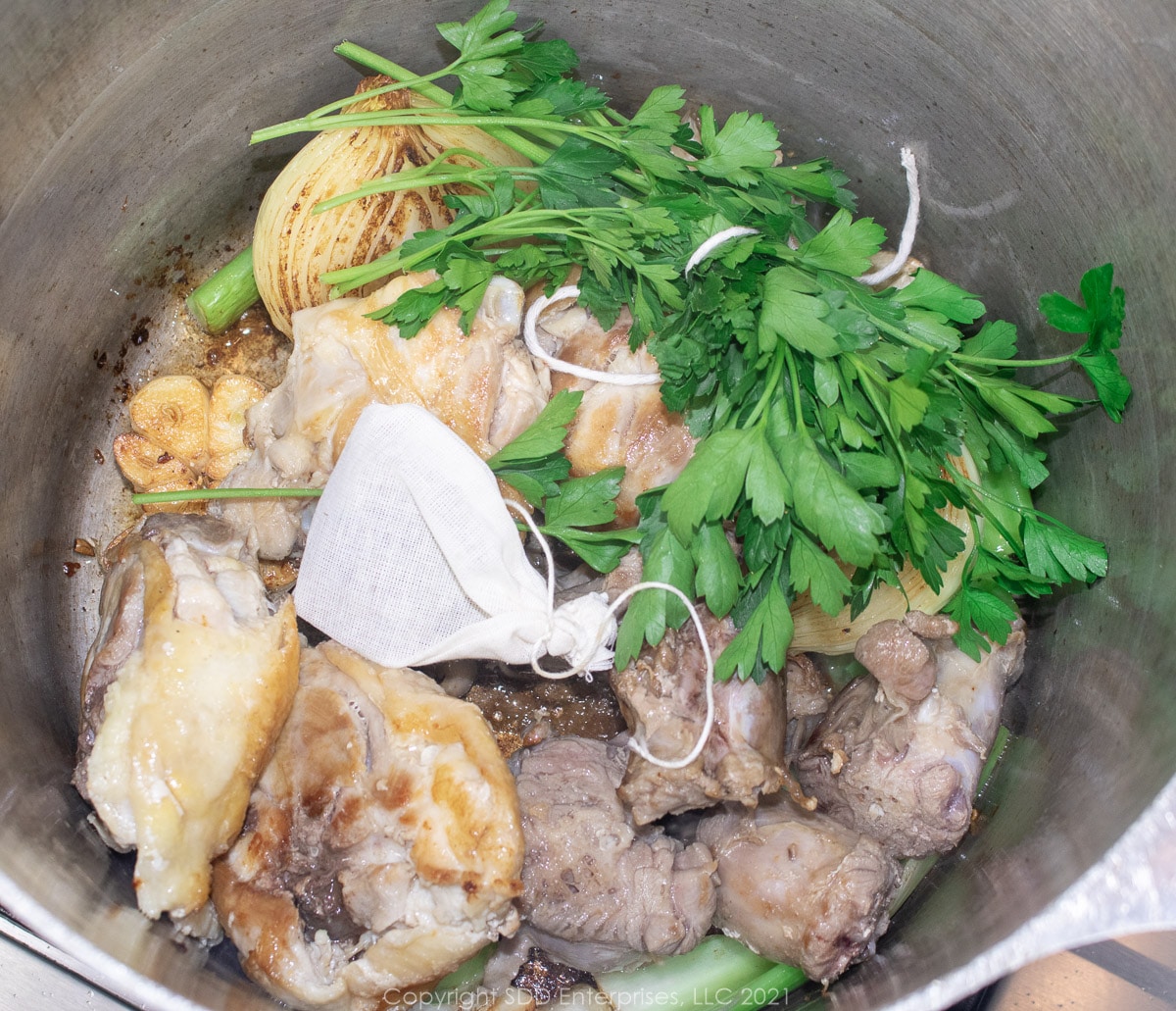ingredienst for poultry stock in a stock pot