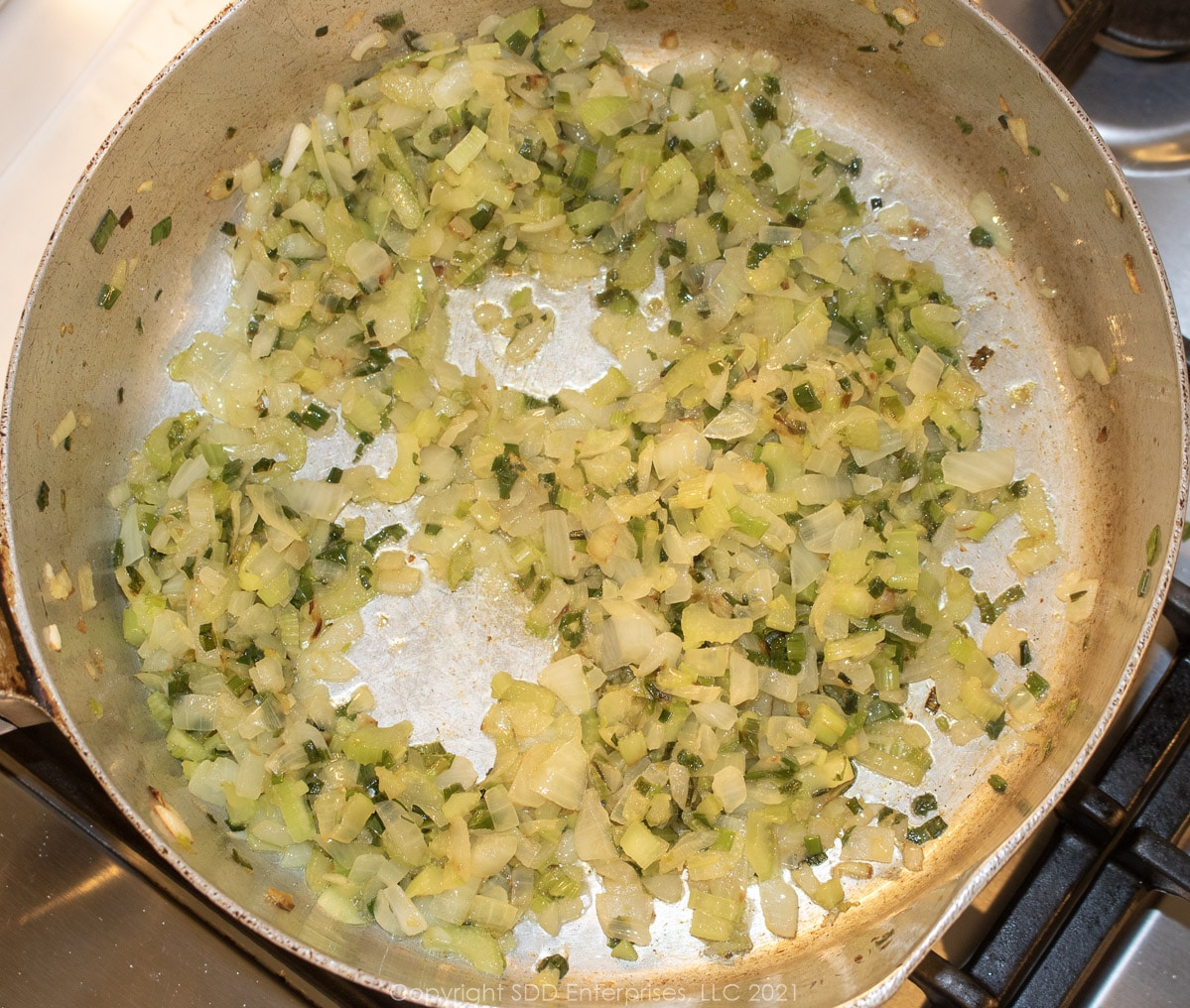 sauteeing vegetables in il in a stock pot for oyster dressing