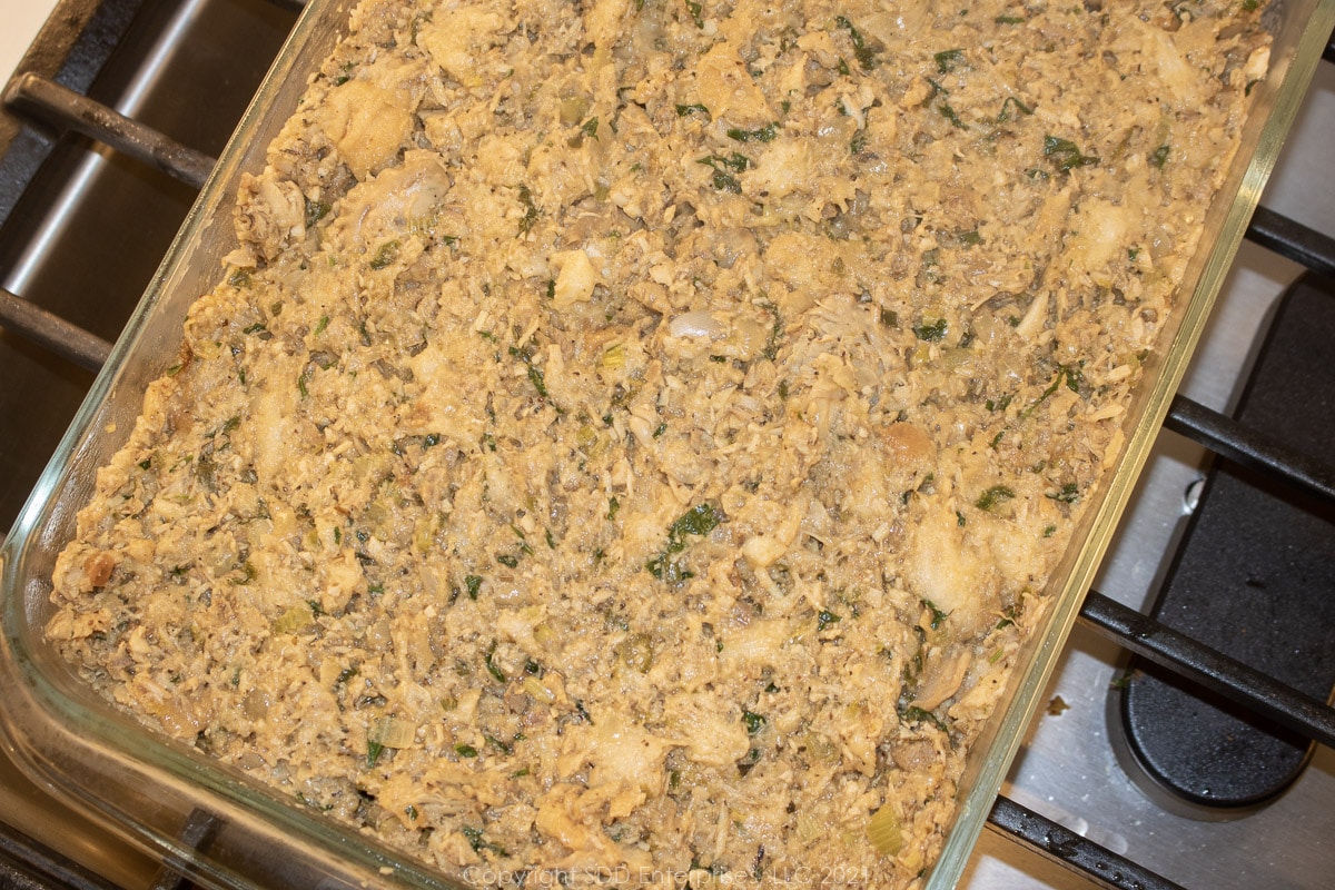 oyster dressing in a baking dish ready for the oven