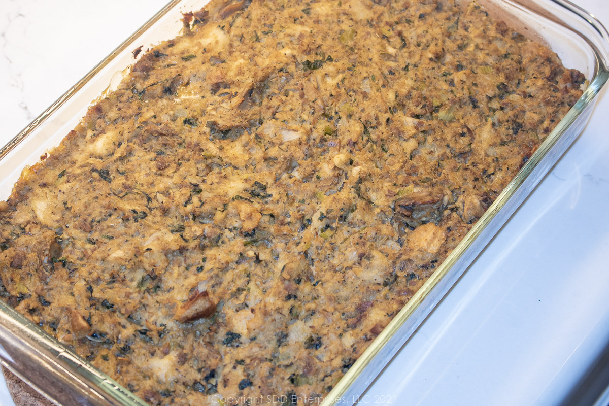 oyster dressing in a glass baking dish right out of the oven