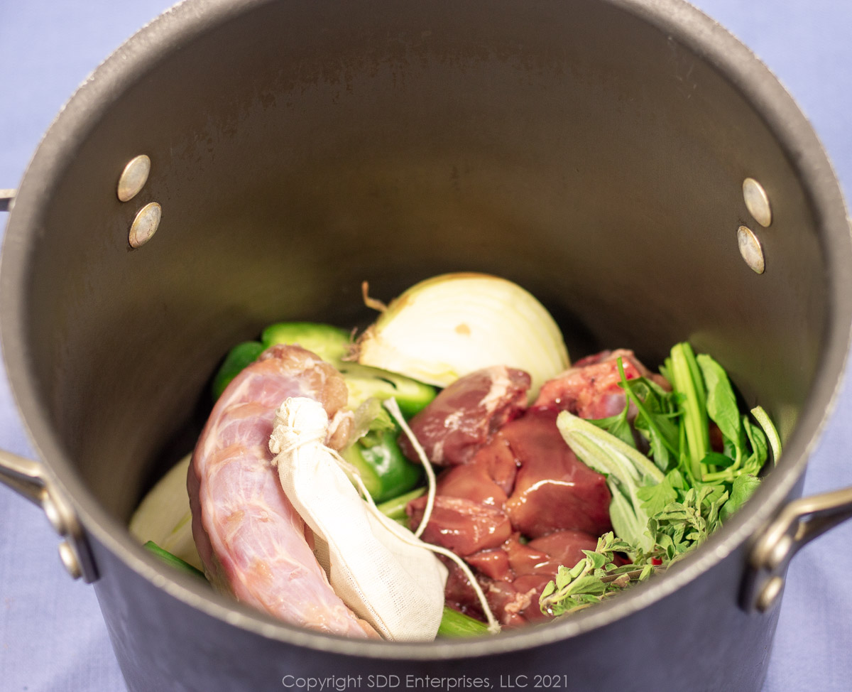 ingredients for turkey stock in a stockpot