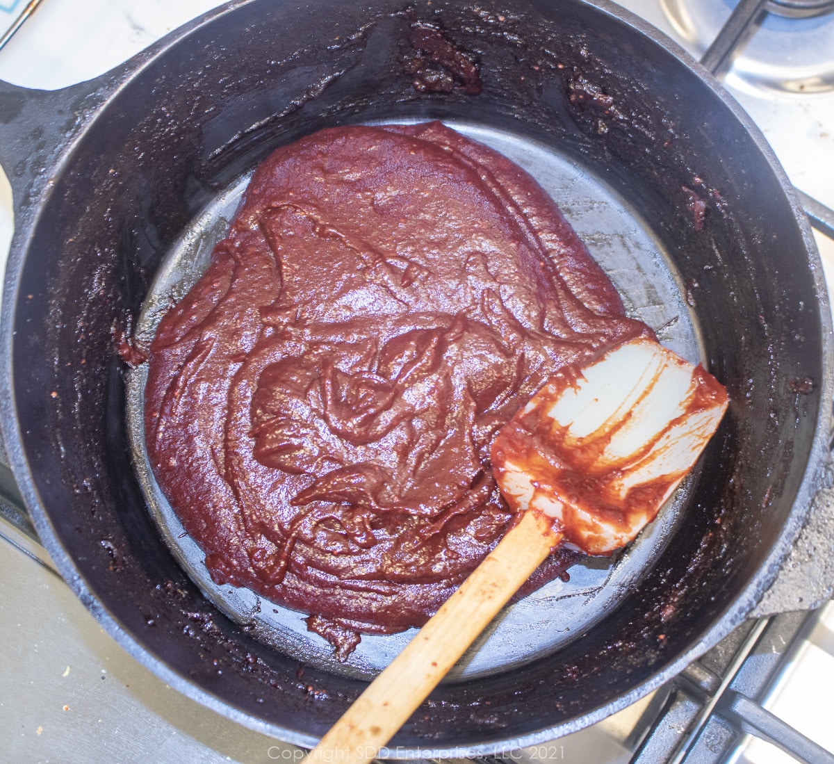 bbq sauce paste base in a Dutch oven