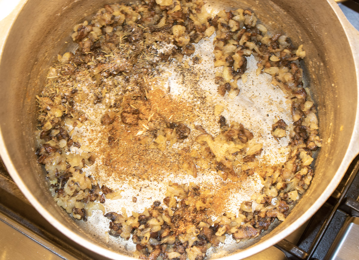 herbs and spices added to mushroom/onion/flour mixture in a frying pan